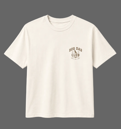 White t-shirt with 'Dog Dad Club' text on a light gray background